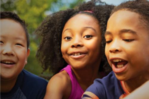 Children smiling at camp