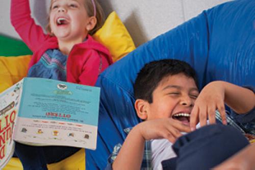 Two kids smiling in child care