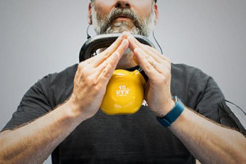 Man holding kettlebell