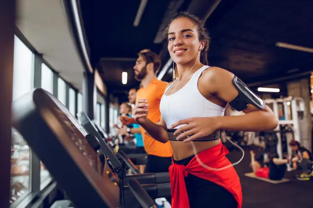 Woman Running on Cardio Machine