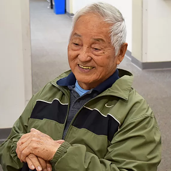 Member fred sitting with coffee