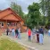 Campers stand in front of the Camp Loma Mar dining hall and wait to get called in for lunch.