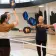 Group of Pickleball players with paddles up at the Oakland YMCA