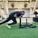 Member pushing sled on turf at the Oakland YMCA