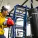 young adult male training with punching bag at the Richmond Parkway YMCA